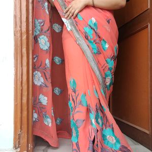 Peach Coloured Saree With Stitched Blouse