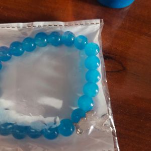 Blue Coloured Glassy Plastic Bead Bracelet From