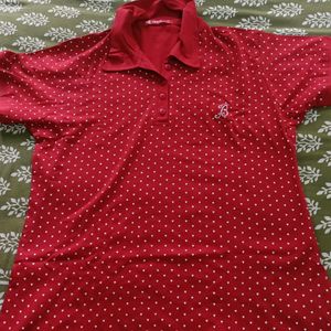 A Beautiful Red Polo T Shirt For Women In Size XL.