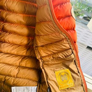 Orange puffer packable jacket