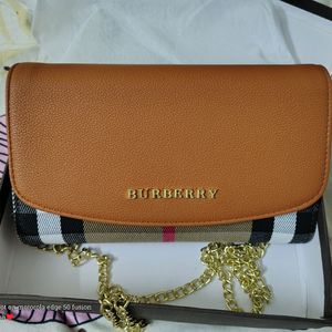 BURBERRY CLUTCH+SLING