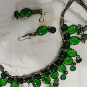 A Necklace,  With Earrings One Stone Missing