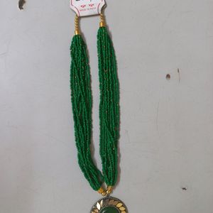 MULTILAYERED GREEN BEADS NECKLACE