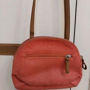 Baggit Leather sling Bag Coral Color With 2 Compar