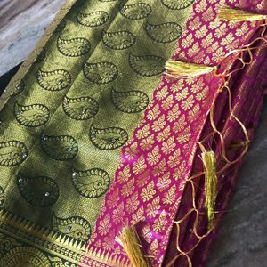 Pink And Parrot Green Pattu Saree.