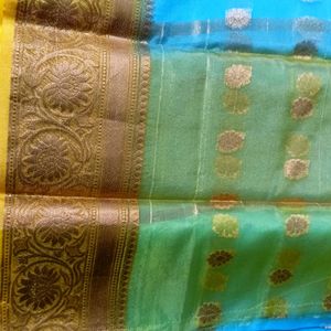 Colours Silver Pattu Saree.