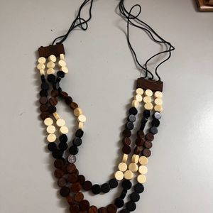 Long wooden three layered chain