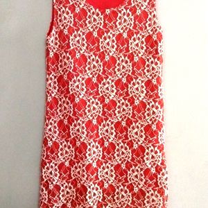 Beautiful Orange Sleeveless Tunic With White Flower Print On It..❤️