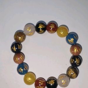 Om Mani Seven Chakra Round Bead Bracelet.