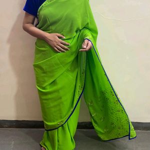 GREEN SAREE WITH BLUE BLOUSE