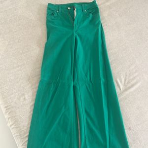 green pants perfect to go with black tops