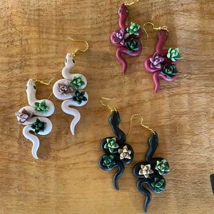 Snake Earings Each With