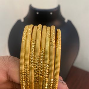 One Gram Gold Plated Bangales Very Reasonable Price .6 Month Colour Garantee Pack Of 8 .size 2.4 ,2.6,2.8 Available offer Offer Offer