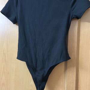 Black Ribbed Bodysuit With Cutout