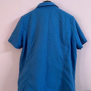 A Blue UNISEX Shirt.