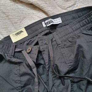 parachute pants, new with tag, no coins