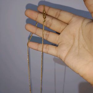 Two Cute Little Pendants (the small one is slightly oxidised) and Two Simple Artificial Gold Chains.