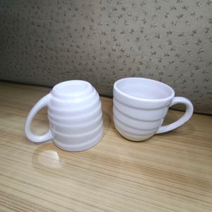 Set Of Two Tea Cups...