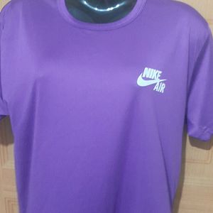 NIKE AIR PURPLE ACTIVE WEAR TSHIRT.