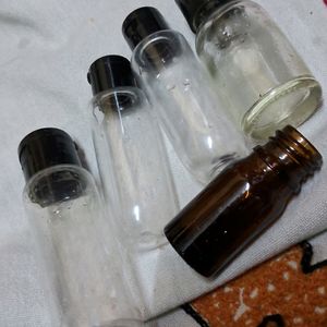 4 Empty Small Bottles