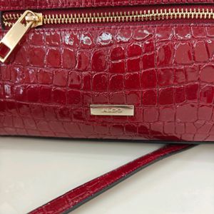 Aldo burgandy/Maroon Sling Bag