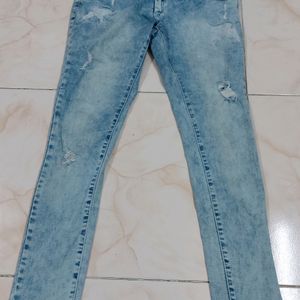 Women's Light Blue Slim Fit Ripped Jeans