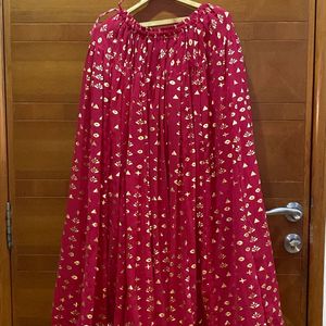 Red long ethnic skirt with golden print