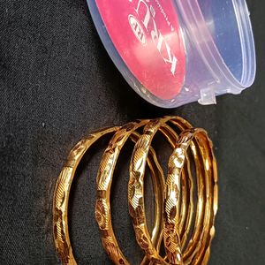 4 Pieces Golden Bangles.2.2 Size.