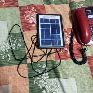 Solar Plate With Telephone As Freebies