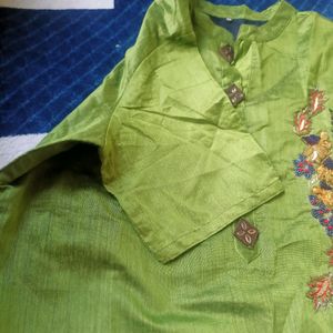 Green Unused Kurti With Embroidery Work With Stones On It