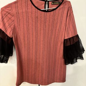 Beautiful Rust Top With Black Frill Sleeves