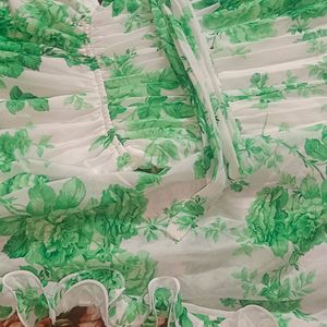 Green floral Print georgette Gown.