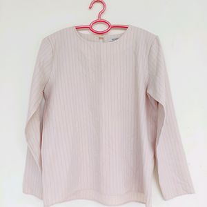 Beige top with black stripes