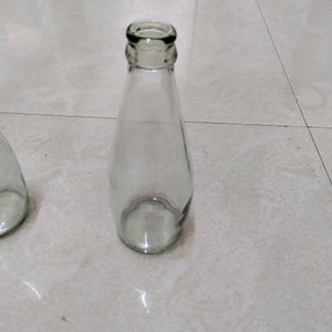 7 Empty Glass Bottles