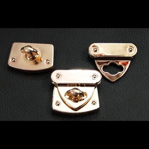 Golden Bag Buckles ₹64 For 2 Pairs