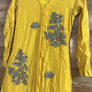 A Yellow Kurta Set With Long Trail