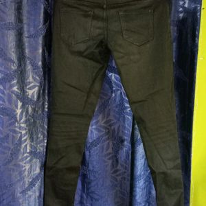 Stretchable Black Branded Jeans. Fits 26-28 Size.