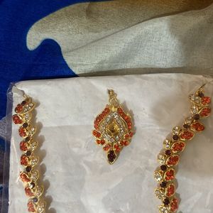 Unused Golden & Orange Jewelry Set