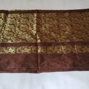 Brown Saree With Rich Pallu