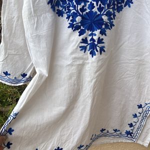 Short Kurti With Blue Work On It