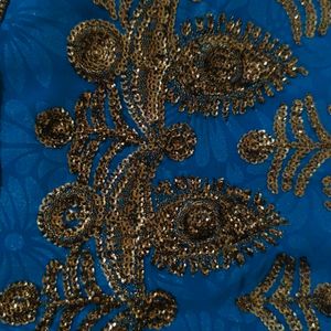 Peacock Blue Georgette Saree With Stitched Blouse