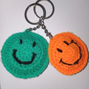 Pack Of Two Smiley Keychain Green And Orange