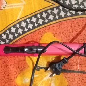 Electric Hair Curler And Straightener