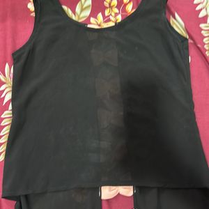 Black Top With Pink Bow In Back Side Of To