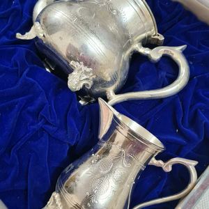 Antique Tea Set with silver polish