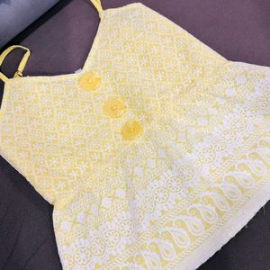 Yellow Embroidery Peplum Top