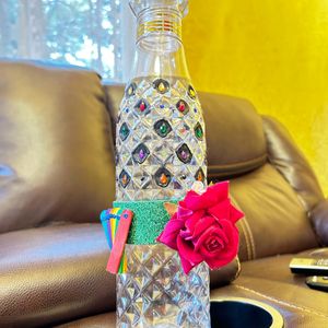 Crystallized designer plastic bottle