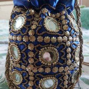 Royal blue colour potli bag..