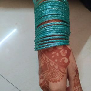 Set Of Bangles And Other Items