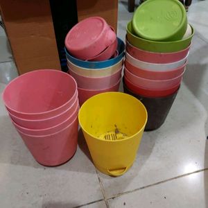 8 Peices gently used self-watering pot! Combo